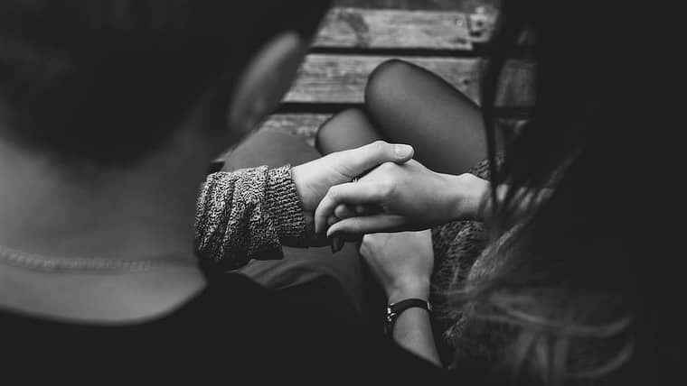 couple holding hands