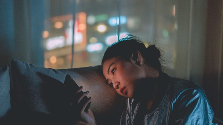 woman using her phone